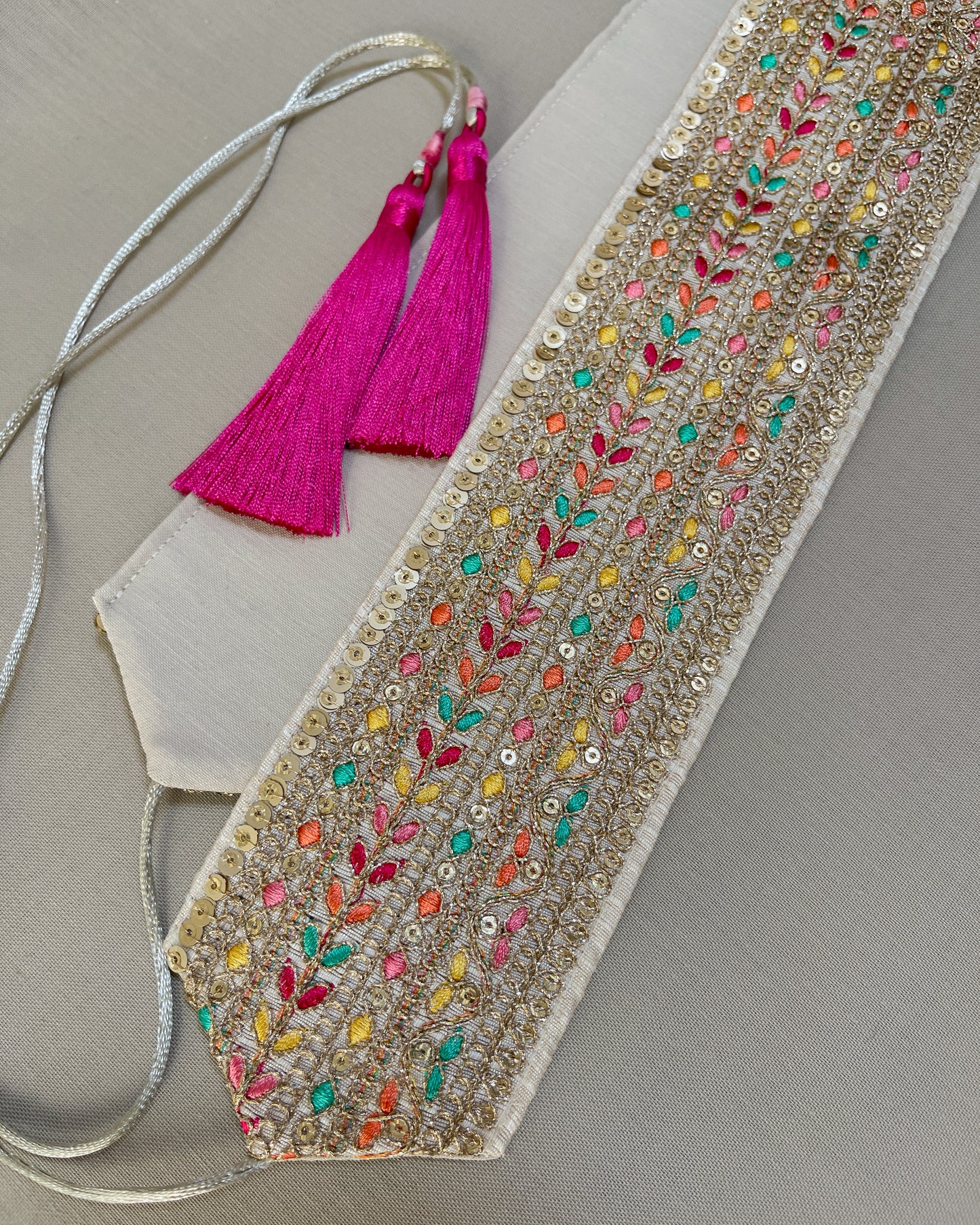 Embroidered obi belt with tassels
