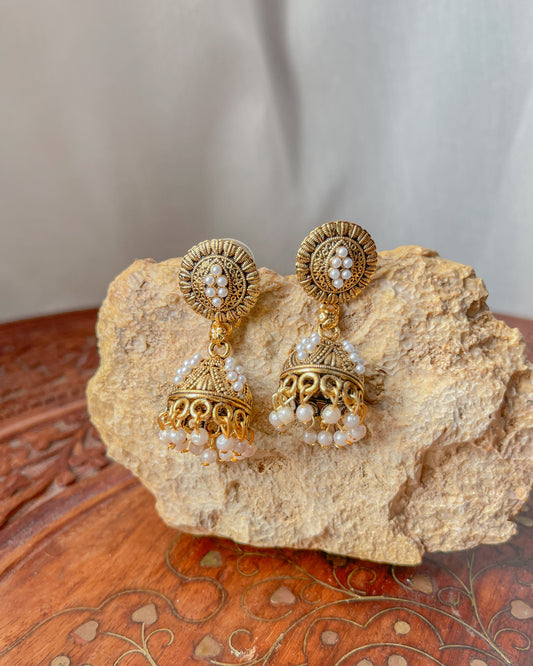 Golden jhumka earrings