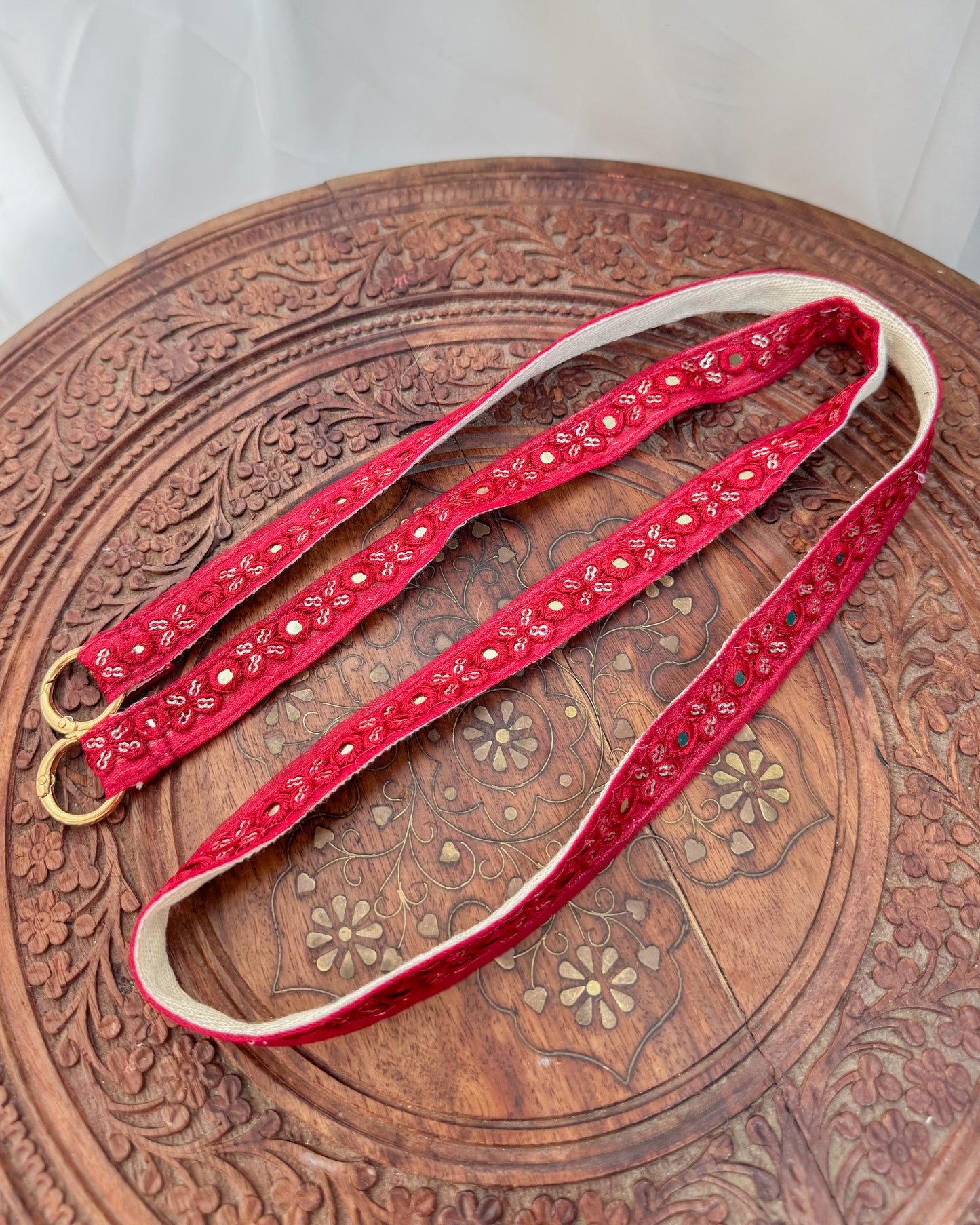 Red embroidered crossbody strap for phone
