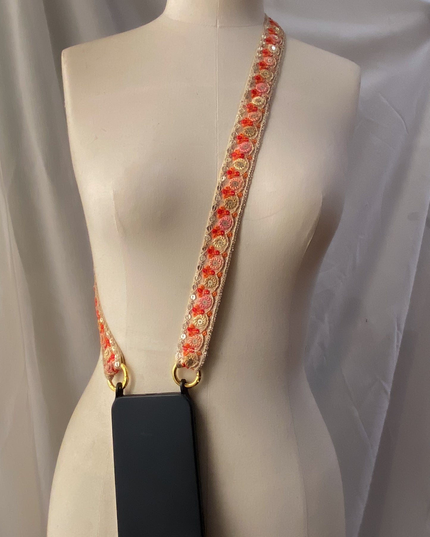 Embroidered crossbody strap for phone