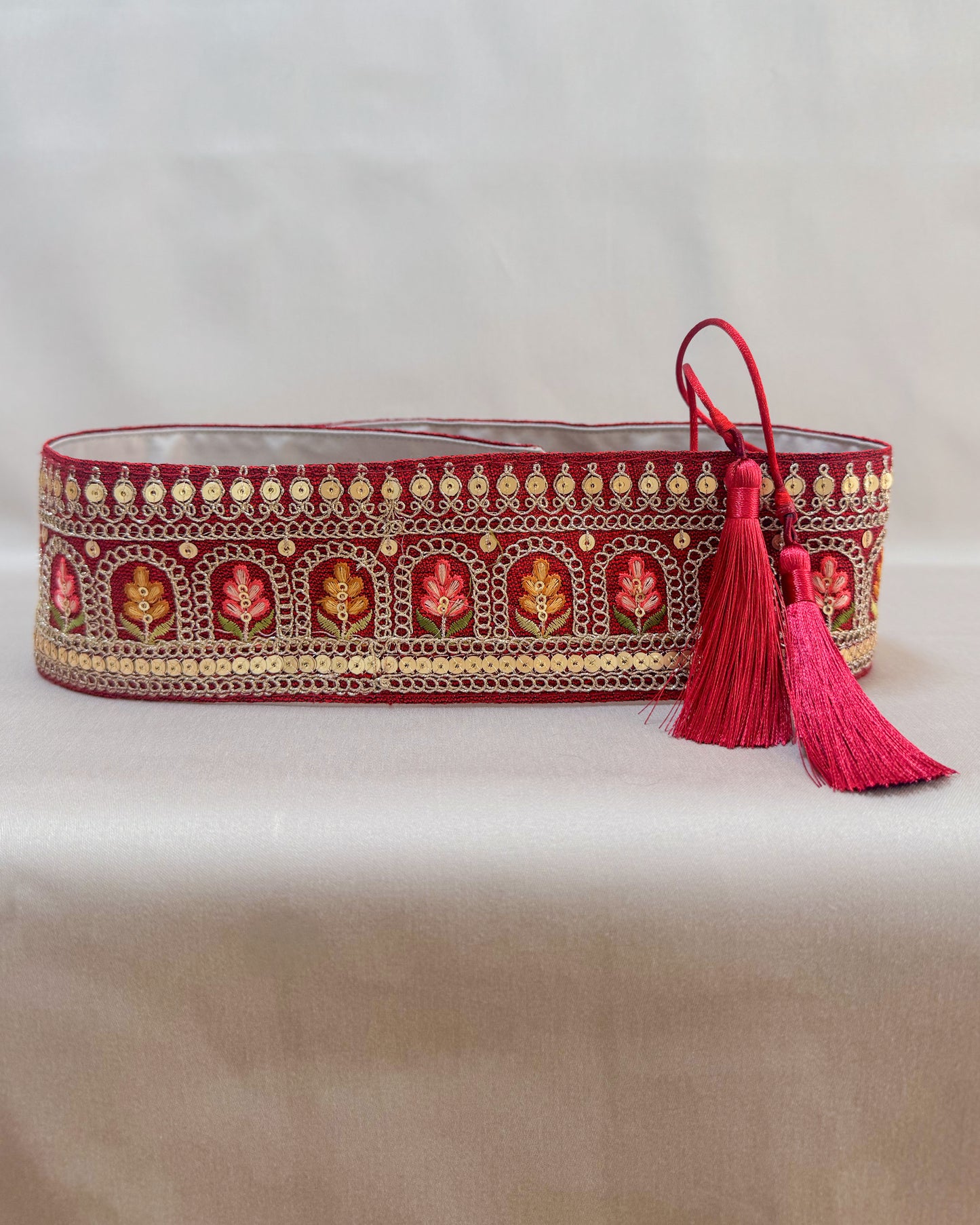 Red bohemian embroidered obi belt with tassels