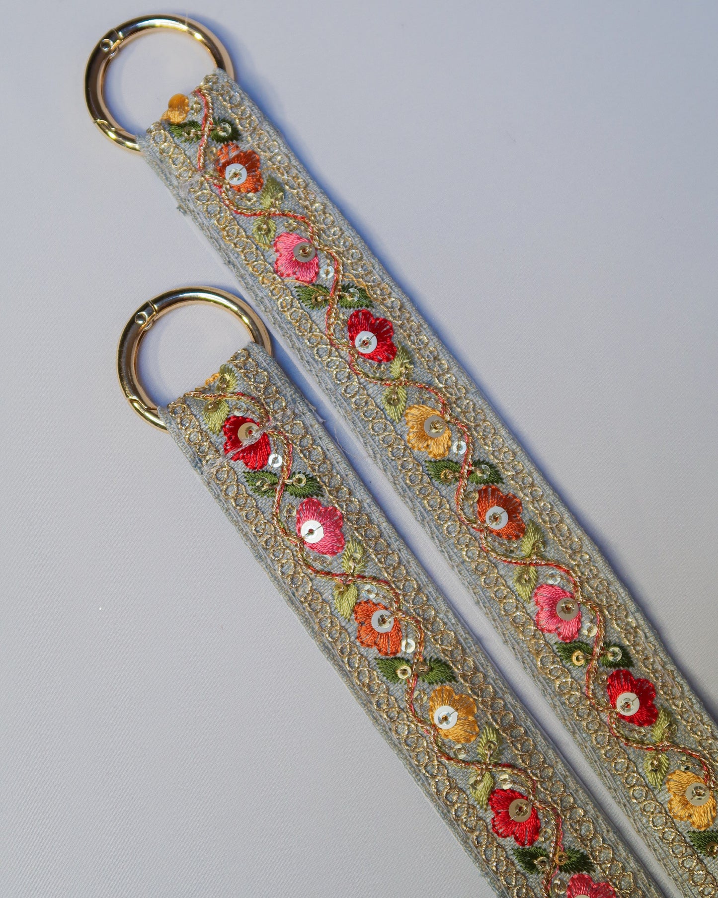 Embroidered crossbody strap for phone