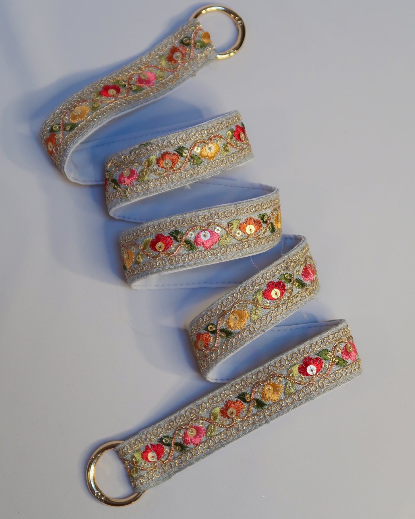 Embroidered crossbody strap for phone