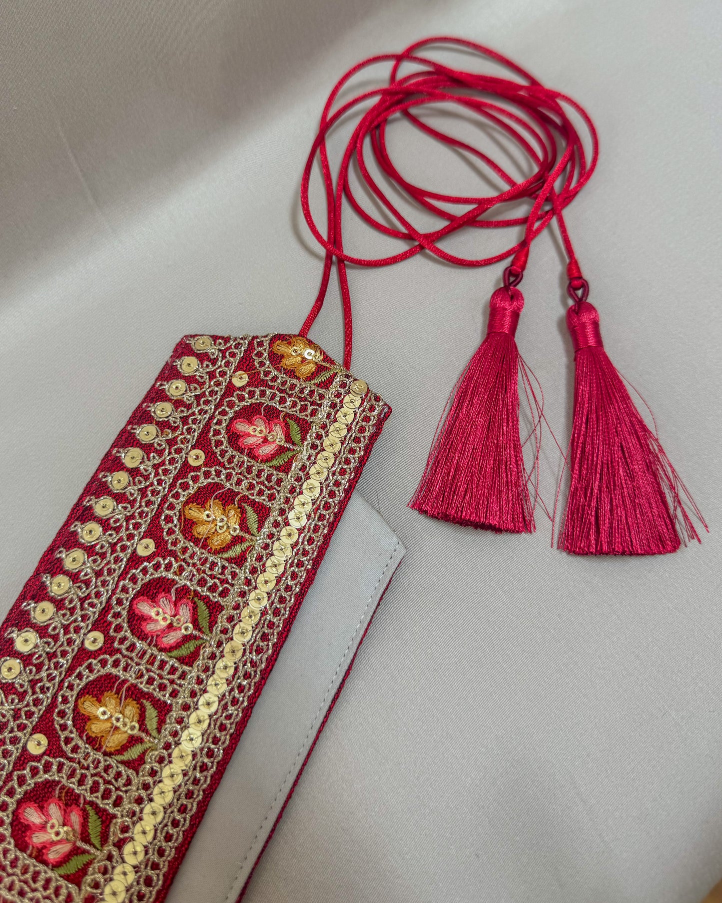 Red bohemian embroidered obi belt with tassels