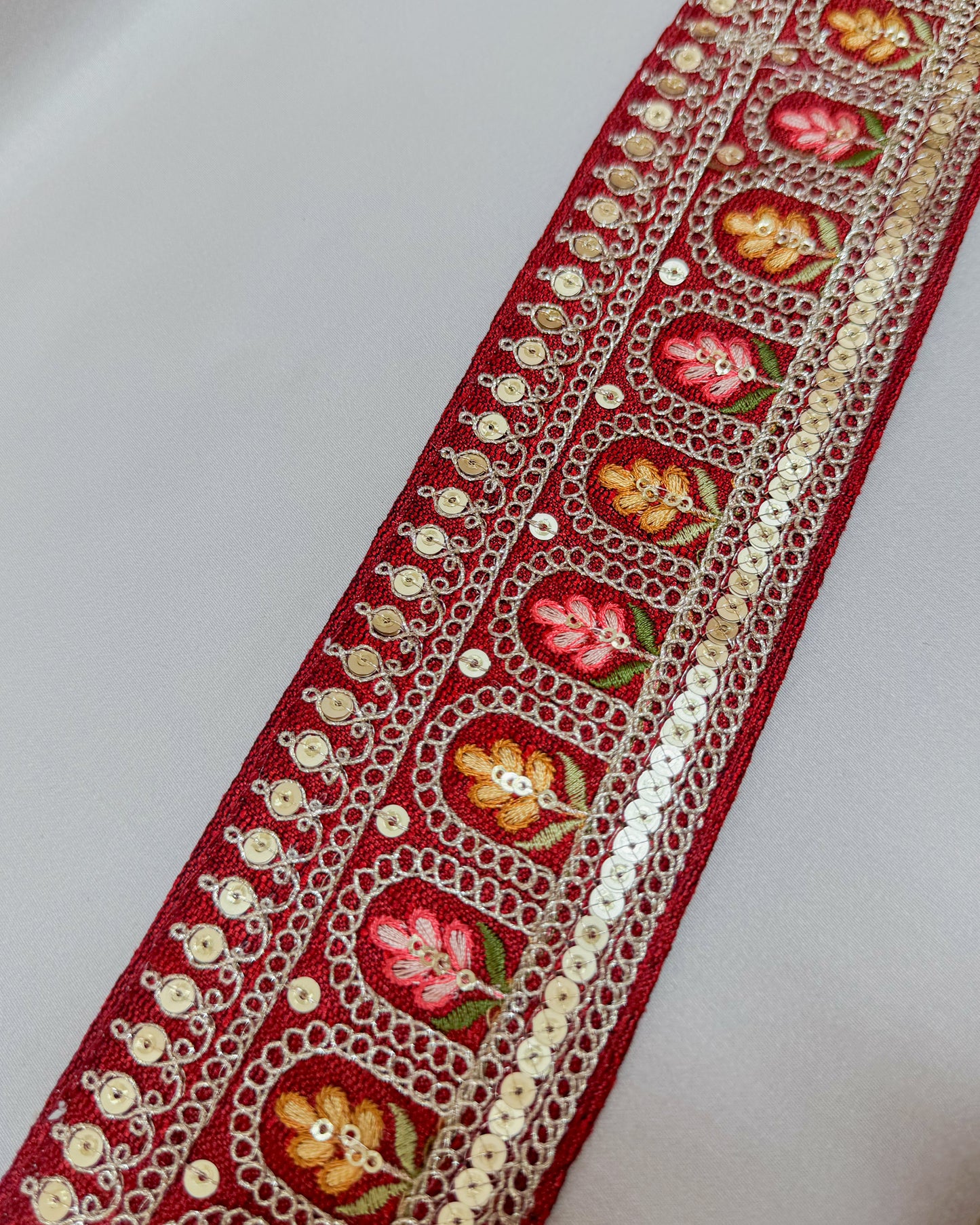 Red bohemian embroidered obi belt with tassels