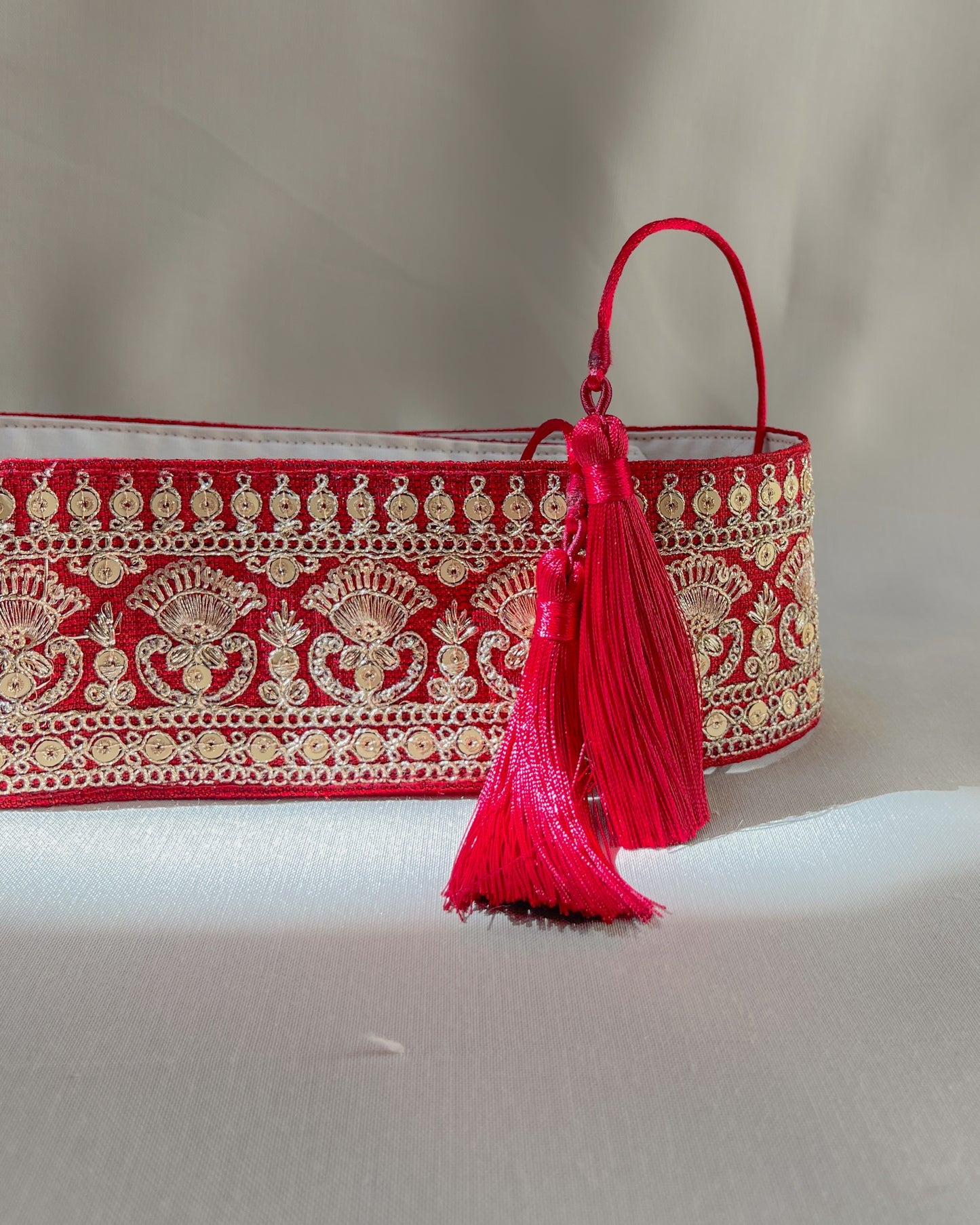 Red bohemian embroidered obi belt with tassels