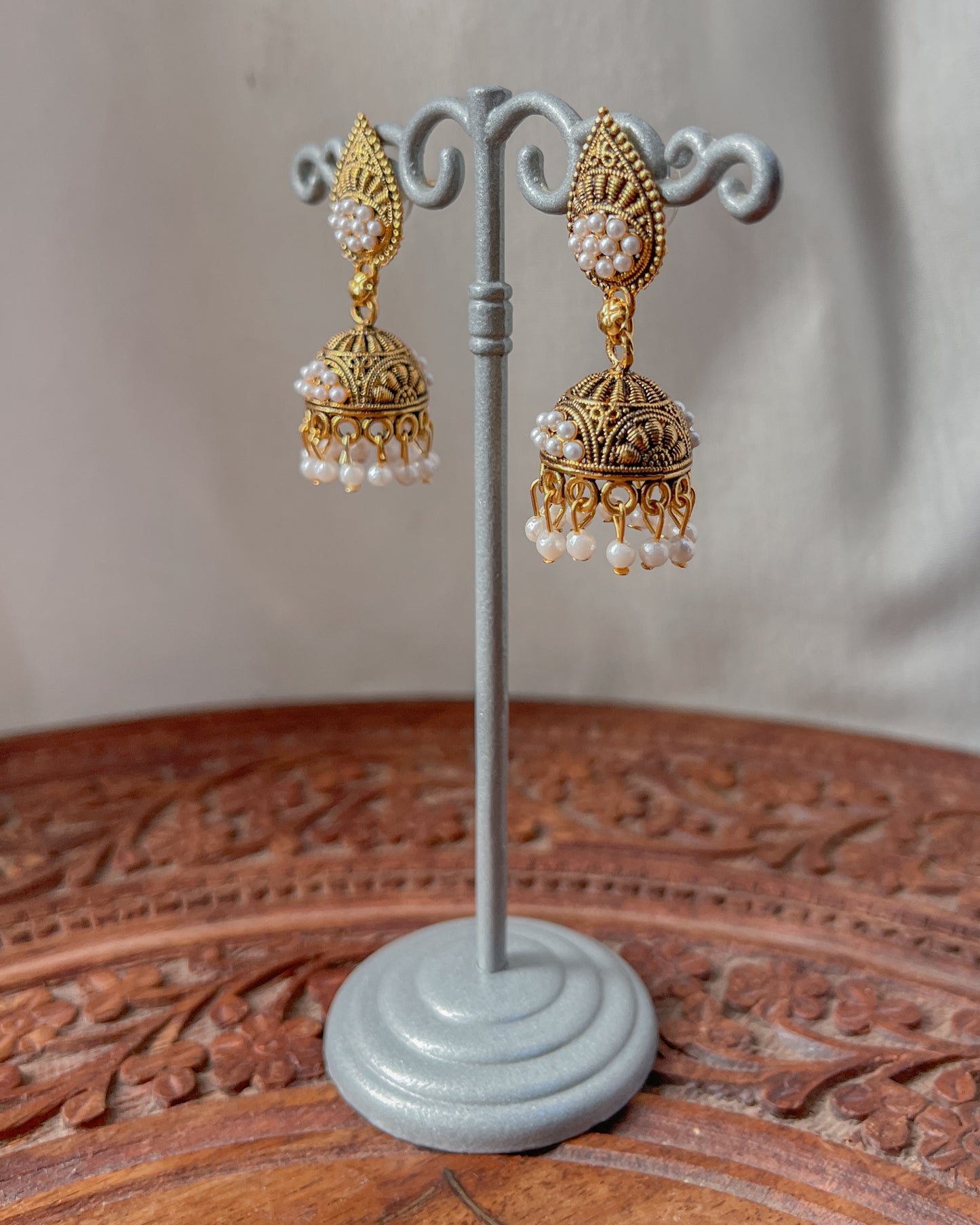 Golden jhumka earrings