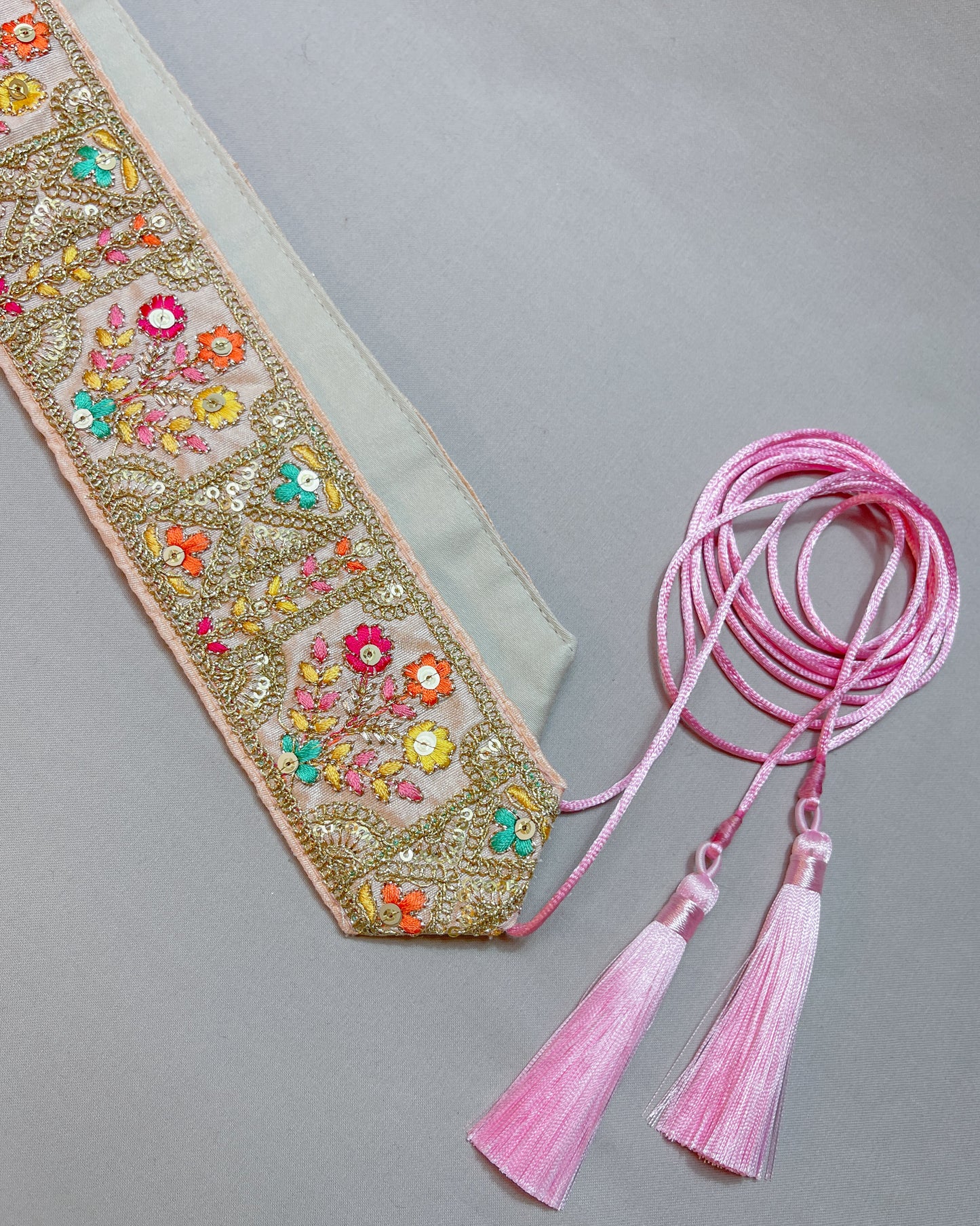 Baby pink bohemian embroidered obi belt with tassels