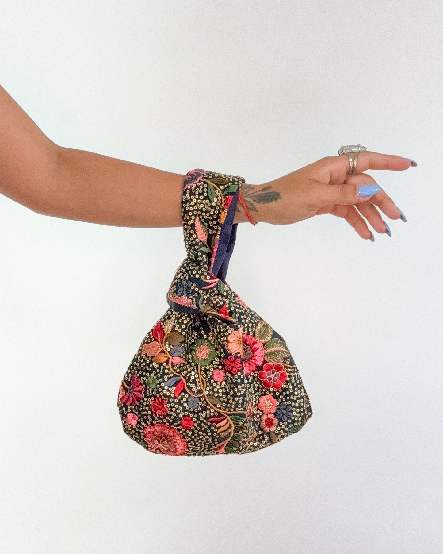 Handmade Embroidered Knot Bag | Blue and gold