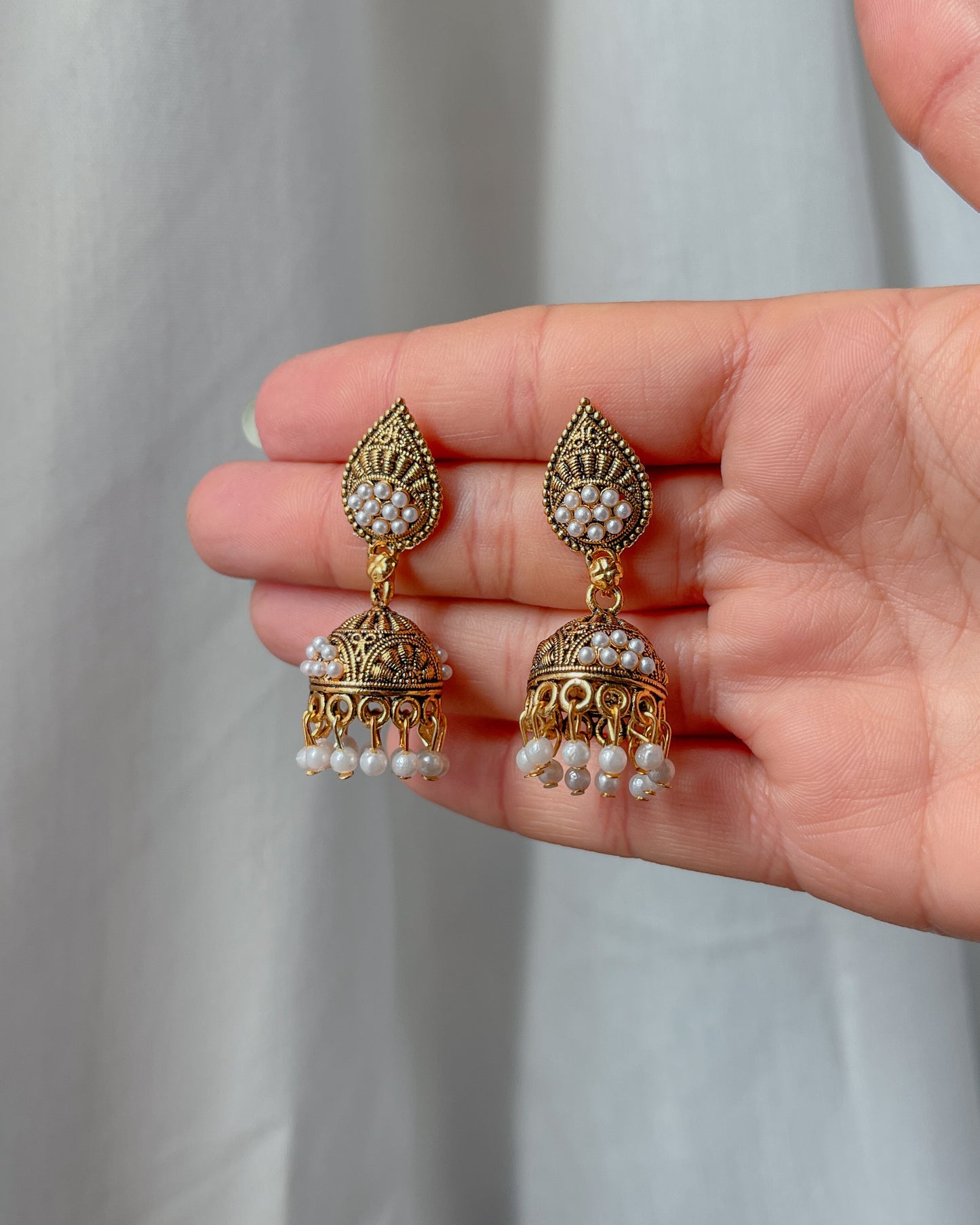 Golden jhumka earrings