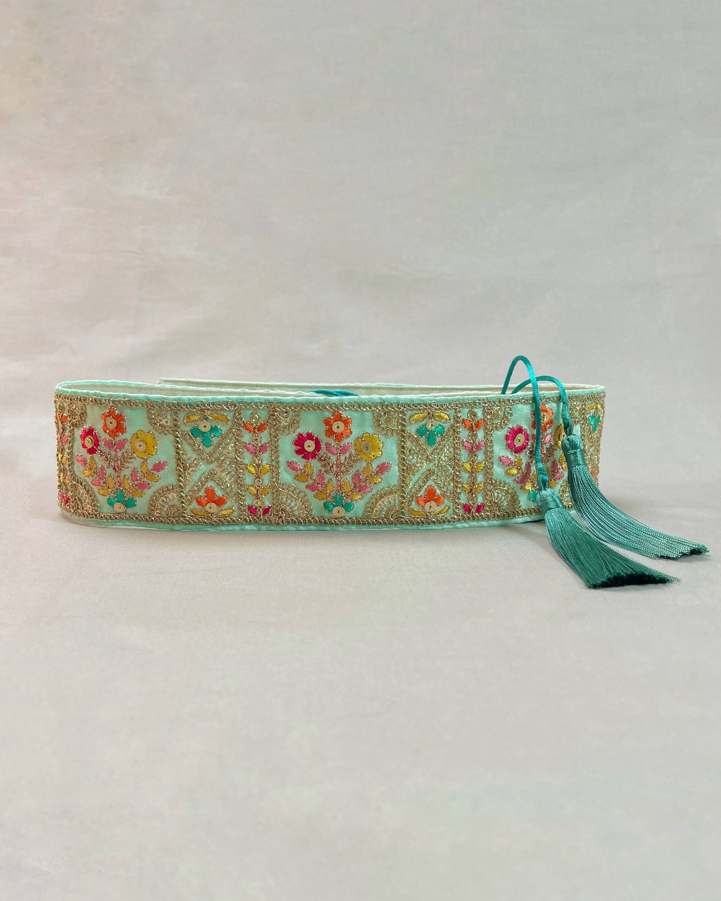 Green bohemian embroidered obi belt with tassels