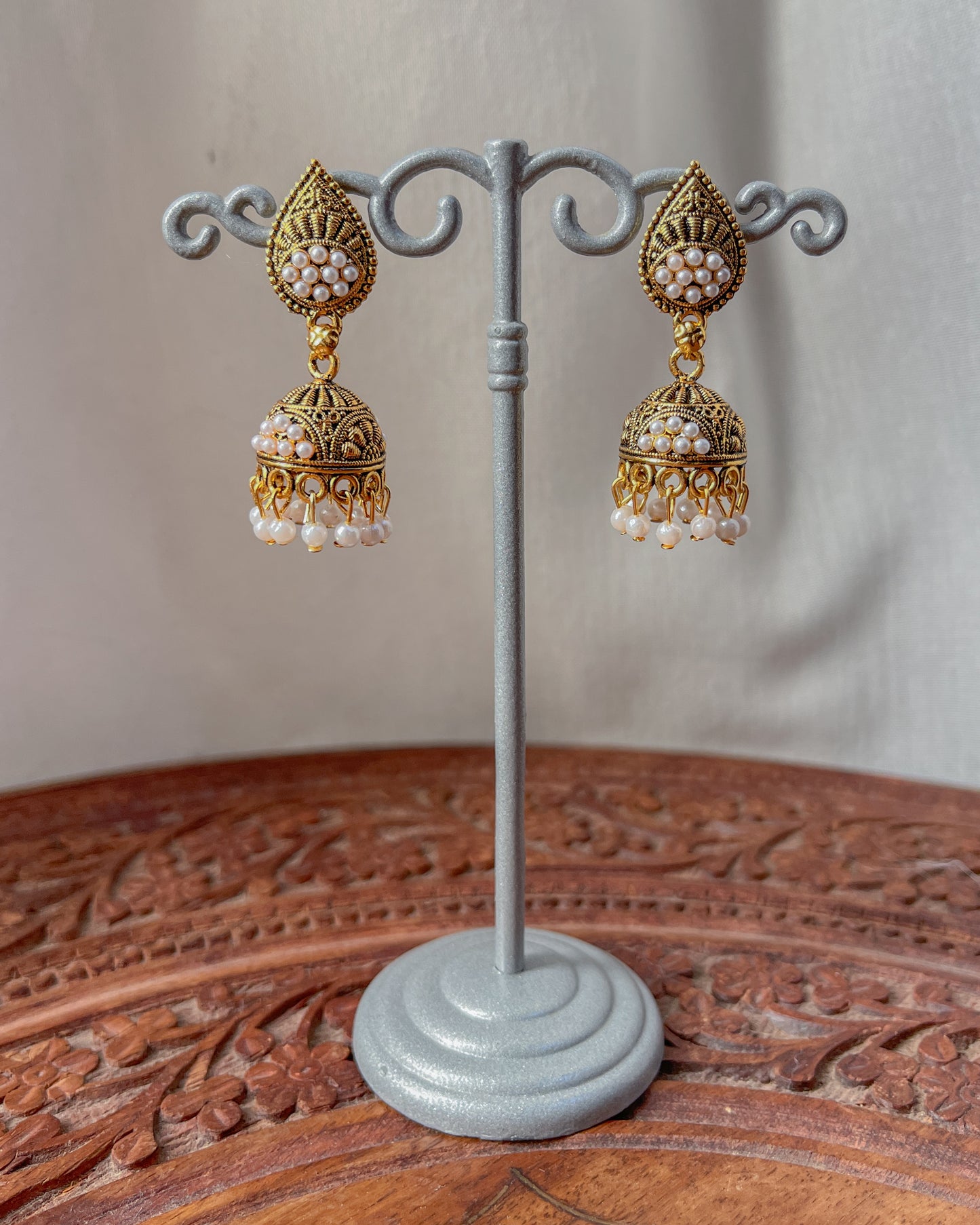 Golden jhumka earrings