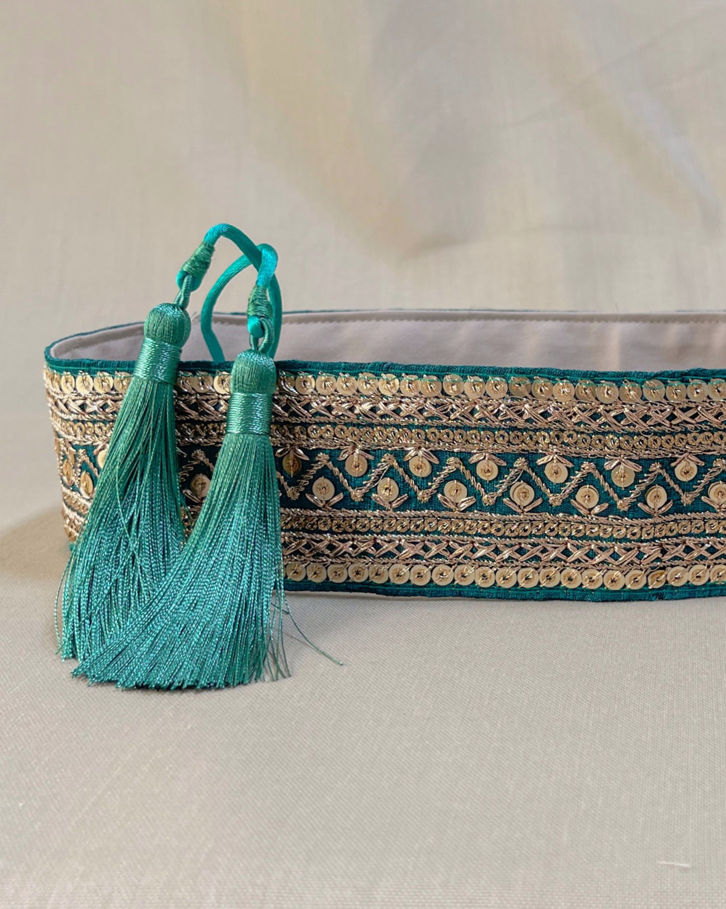 Green bohemian embroidered obi belt with tassels