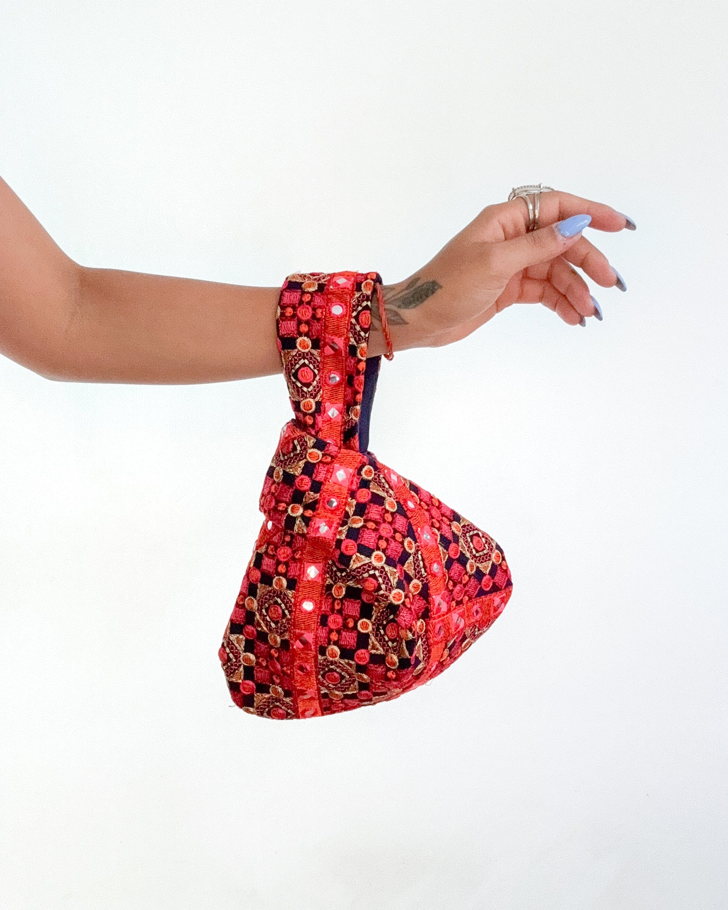 Handmade Embroidered Knot Bag | Blue and orange