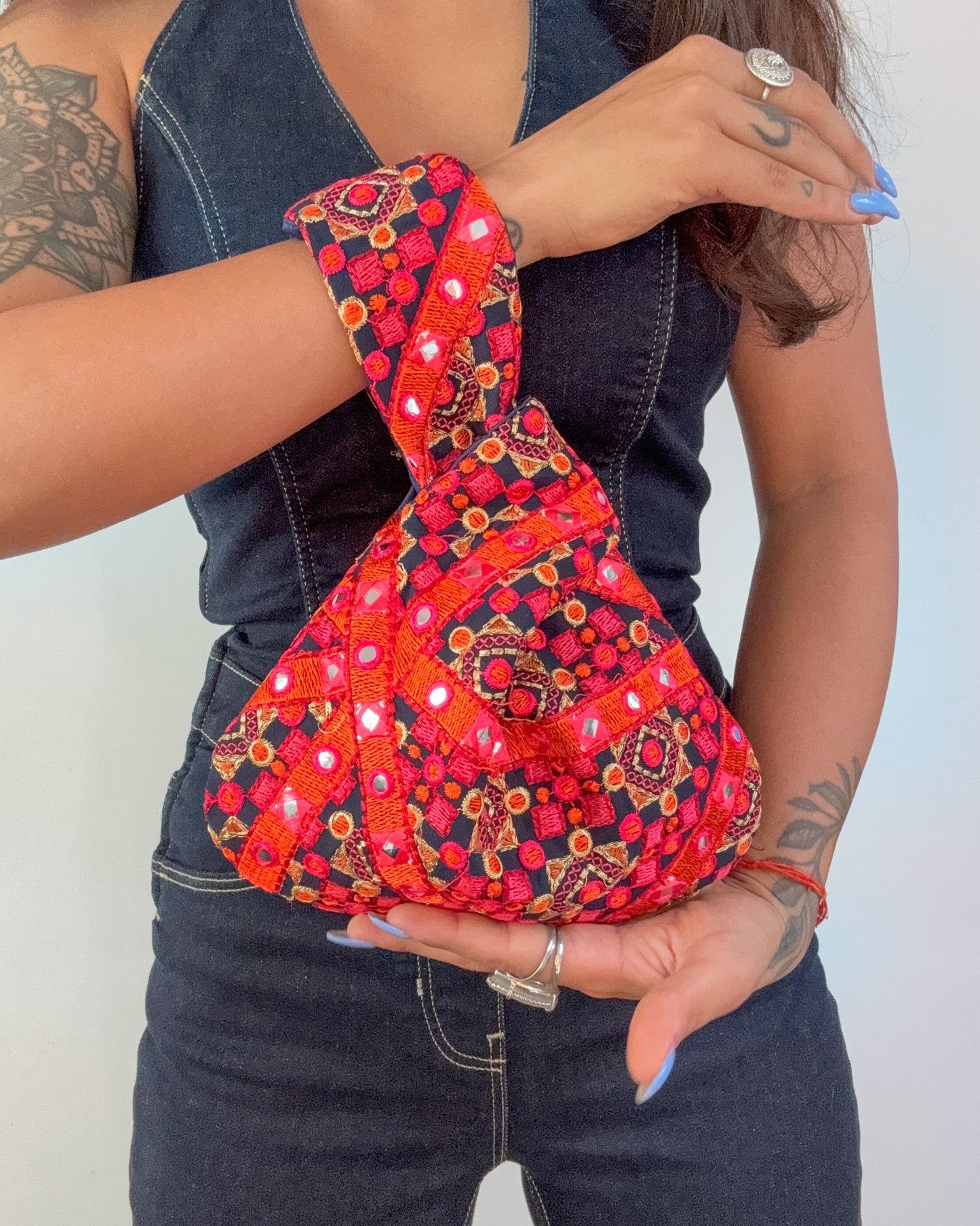 Handmade Embroidered Knot Bag | Blue and orange