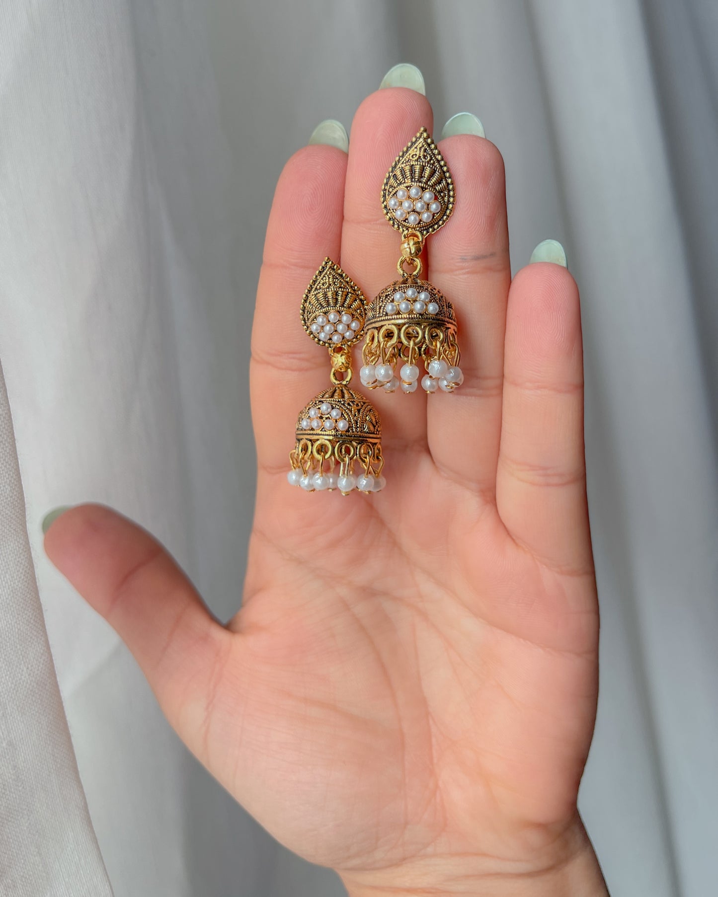 Golden jhumka earrings