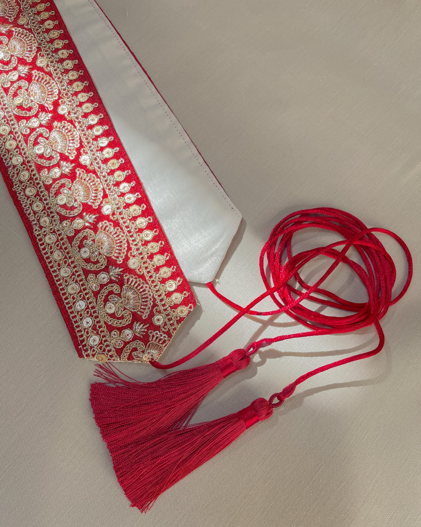 Red bohemian embroidered obi belt with tassels