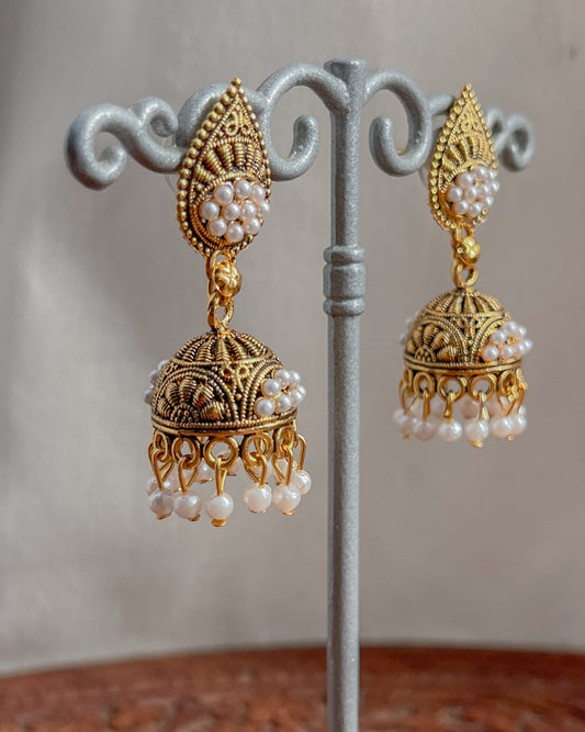 Golden jhumka earrings