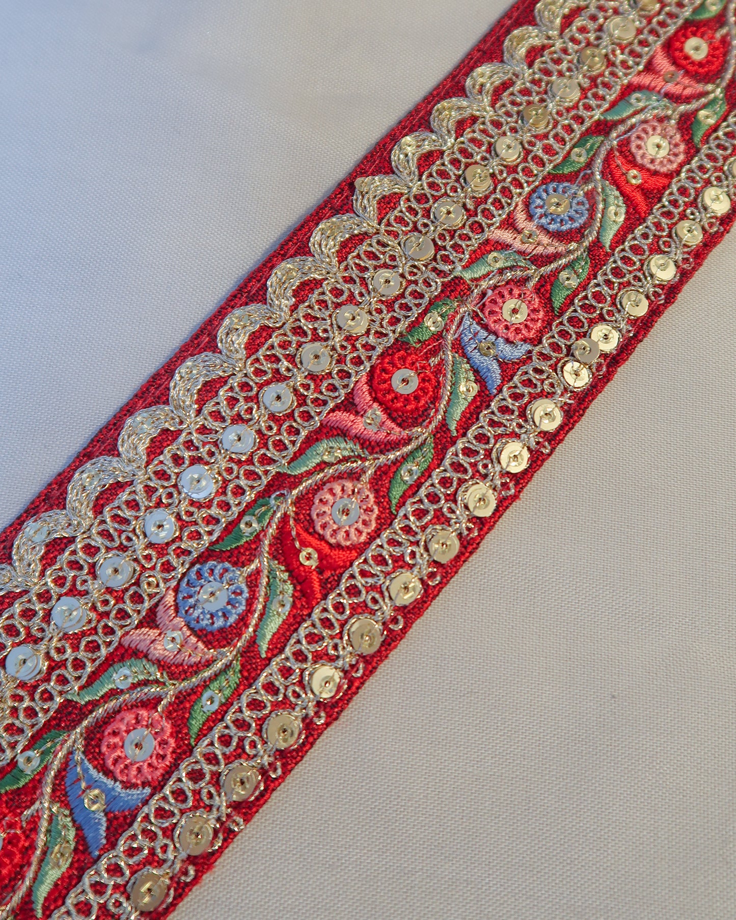 Red bohemian embroidered obi belt with tassels