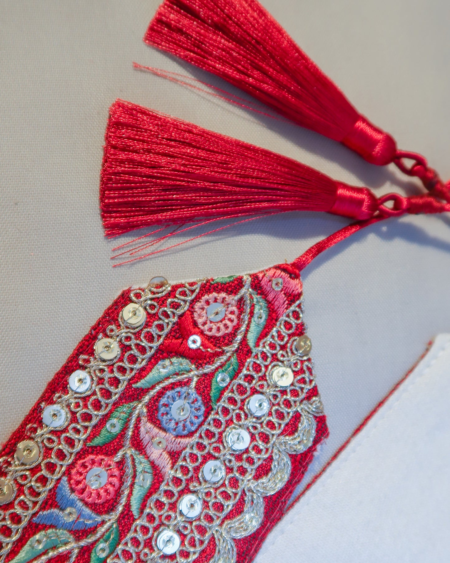 Red bohemian embroidered obi belt with tassels