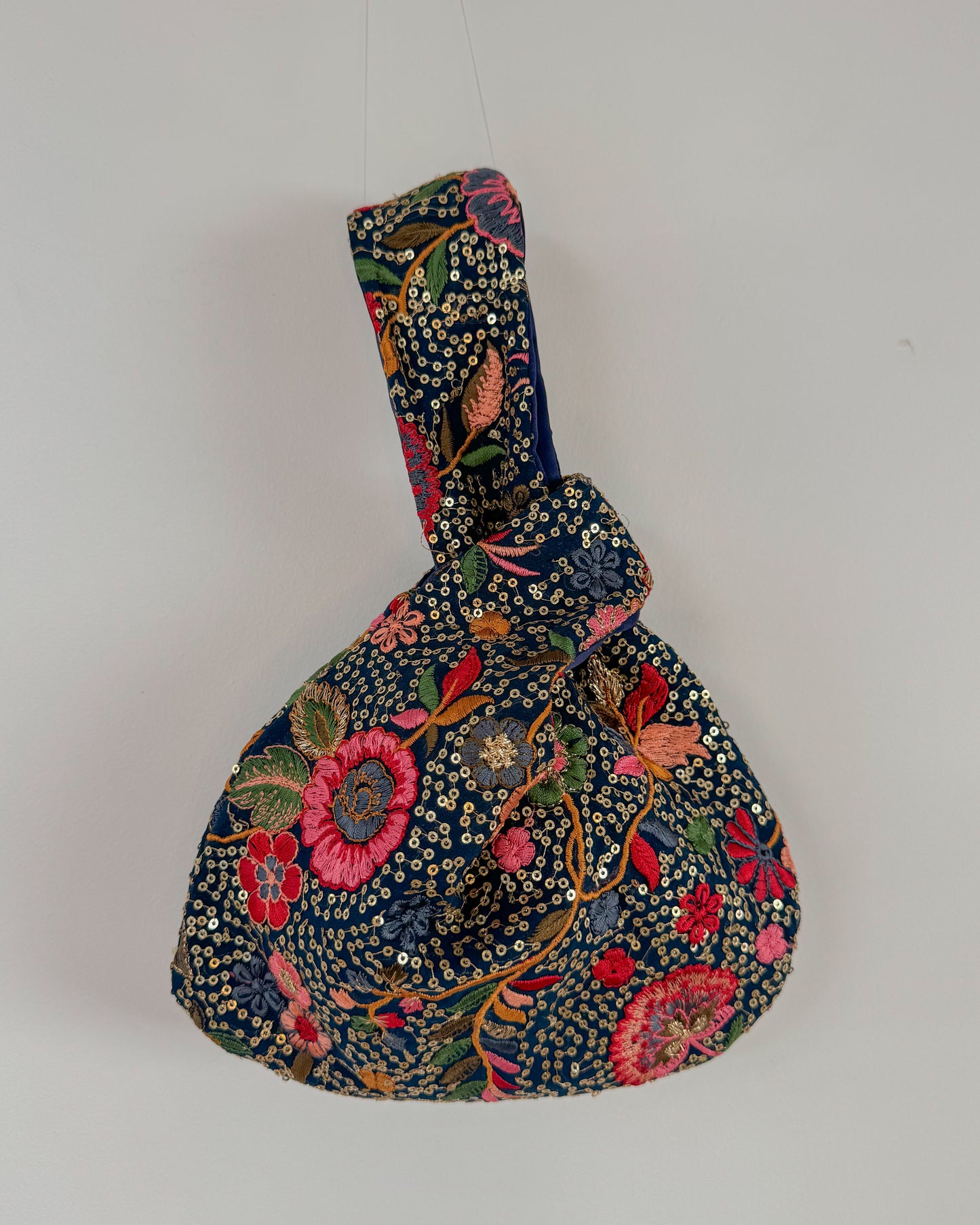Handmade Embroidered Knot Bag | Blue and gold