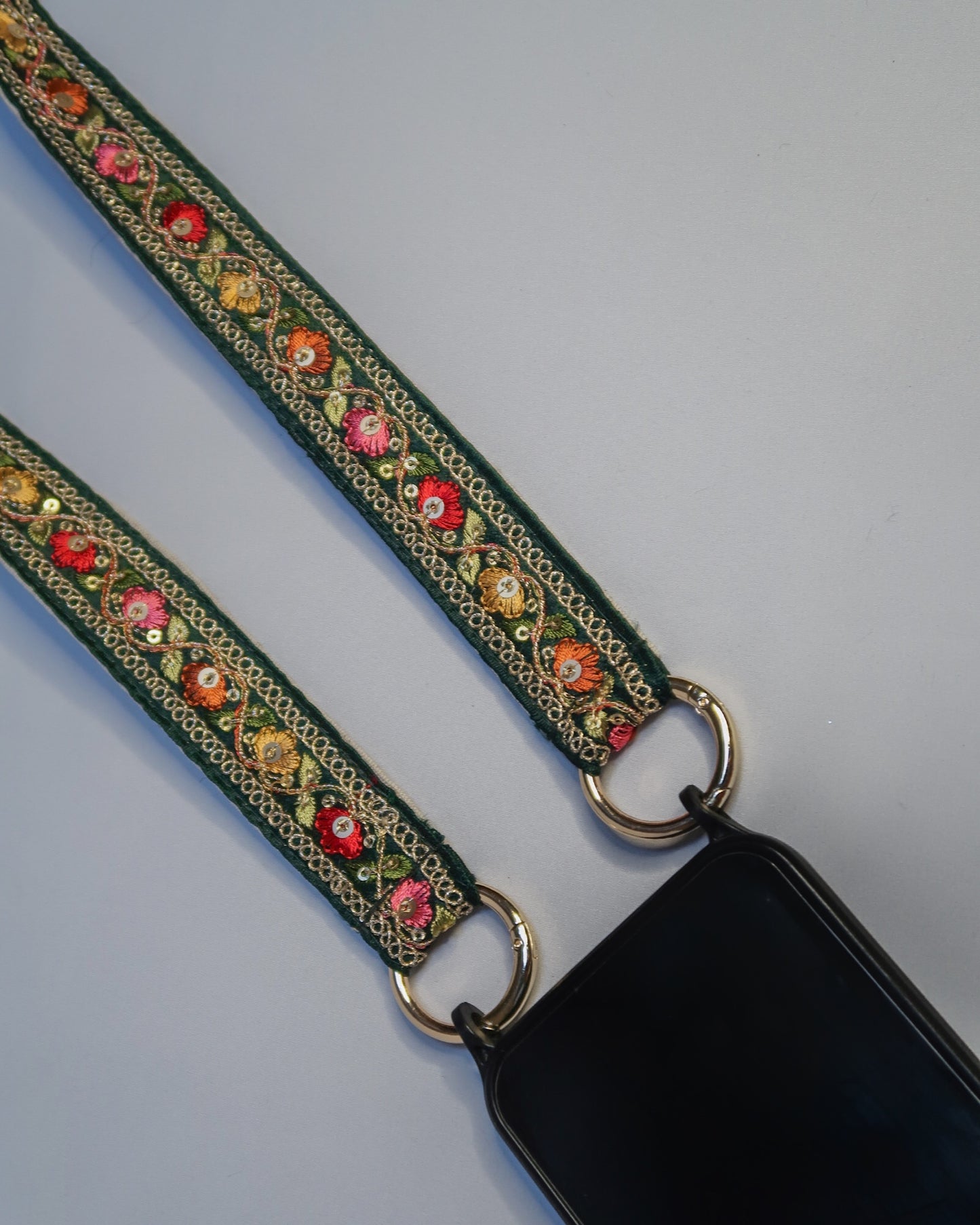 Embroidered crossbody strap for phone